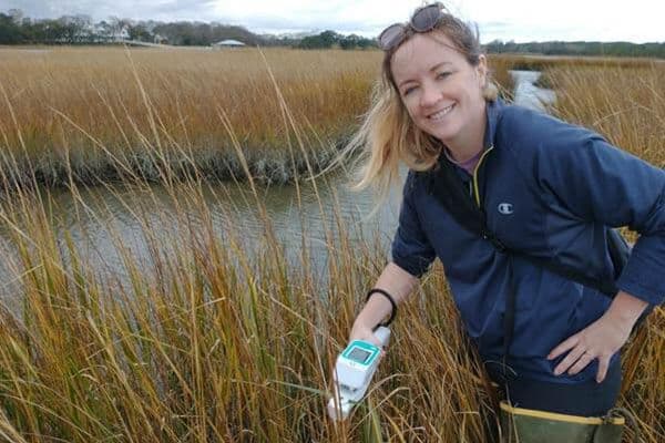 Dr. Sloey researching in wetlands with the LI-600.